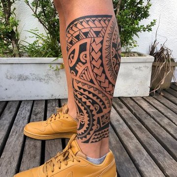 Traditional leg tattoos by Javier Betancourt - Tattoogrid.net