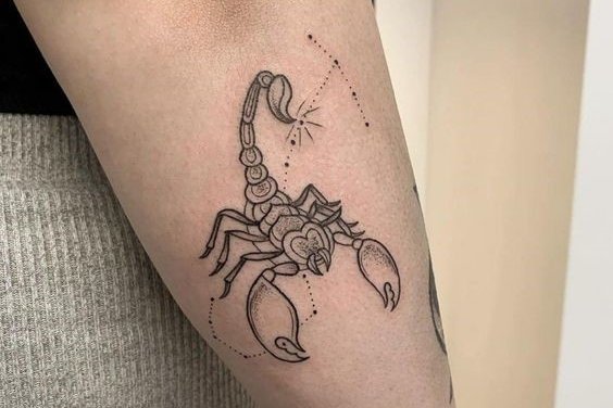 scorpion tattoo on wrist