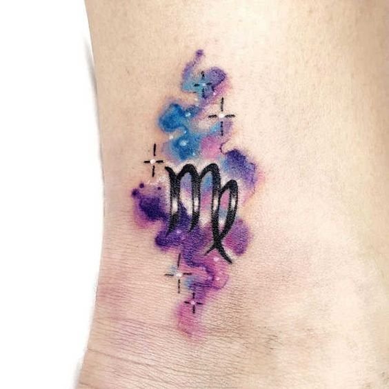 Virgo zodiac symbol tattoo on the inner forearm