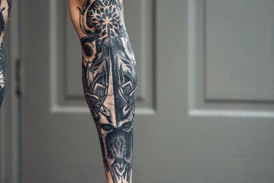 Tattooed calf muscle hi-res stock photography and images - Alamy