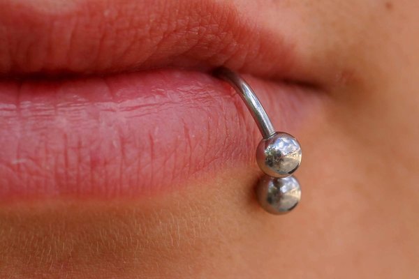Lower lip piercing
