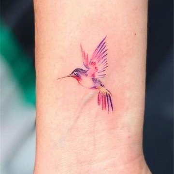 Tattoo Artist Captures the Carefree Fluidity of Watercolor Paint in  Colorful Tattoos | Watercolor bird tattoo, Hummingbird tattoo, Hummingbird  tattoo meaning