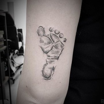 Baby feet tattoo by Basia! Limited appointments available at Revival Tattoo  Studio. | Baby feet tattoos, Foot tattoo, Baby tattoos