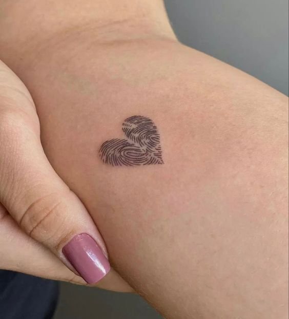 The Known Fringe - Healed photo of this fingerprint heart. Left finger is  of my clients grandmother and the right is of her mother. It was such an  honour to create this